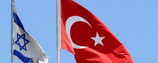 A Turkish flag flutters atop the Turkish embassy as an Israeli flag is seen nearby, in Tel Aviv, Israel June 26, 2016 A Turkish flag flutters atop the Turkish embassy as an Israeli flag is seen nearby, in Tel Aviv, Israel June 26, 2016 - Sputnik International