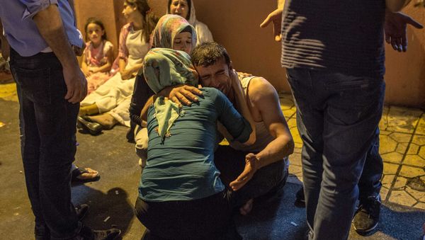 Relatives grieve at hospital August 20, 2016 in Gaziantep following a late night militant attack on a wedding party in southeastern Turkey - Sputnik International