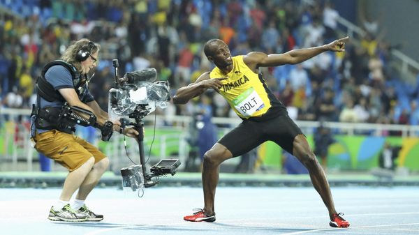 2016 Rio Olympics - Athletics - Final - Men's 200m Final - Olympic Stadium - Rio de Janeiro, Brazil - 18/08/2016. Usain Bolt (JAM) of Jamaica poses after winning the gold - Sputnik International