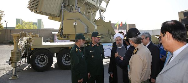 Iran's President Hassan Rouhani (3rd L) and Iranian Defence Minister Hossein Dehghan (2nd L) stand in front of the new air defense missile system Bavar-373, in Tehran, Iran August 21, 2016 Iran's President Hassan Rouhani (3rd L) and Iranian Defence Minister Hossein Dehghan (2nd L) stand in front of the new air defense missile system Bavar-373, in Tehran, Iran August 21, 2016 - Sputnik International