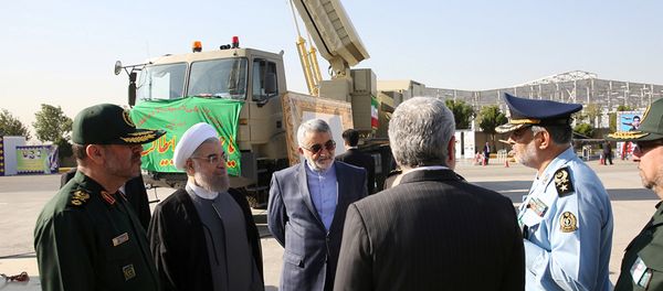 Iran's President Hassan Rouhani (2nd L) and Defence Minister Hossein Dehghan (L) stand near the new air defense missile system Bavar-373, in Tehran, Iran August 21, 2016 Iran's President Hassan Rouhani (2nd L) and Defence Minister Hossein Dehghan (L) stand near the new air defense missile system Bavar-373, in Tehran, Iran August 21, 2016 - Sputnik International