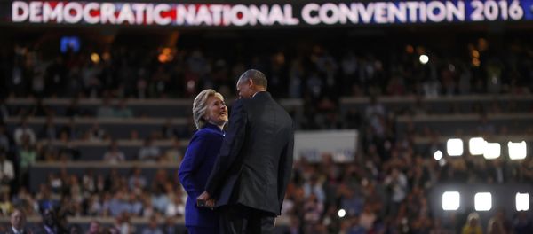 U.S. President Barack Obama and Democratic presidential nominee Hillary Clinton appear onstage together after his speech on the third night at the Democratic National Convention in Philadelphia, Pennsylvania, U.S. July 27, 2016 - Sputnik International