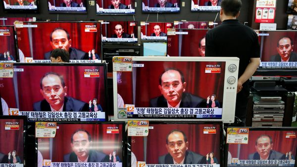 A sales assistant watches TV sets broadcasting a news report on Thae Yong Ho, North Korea's deputy ambassador in London, who has defected with his family to South Korea, in Seoul, South Korea, August 18, 2016 A sales assistant watches TV sets broadcasting a news report on Thae Yong Ho, North Korea's deputy ambassador in London, who has defected with his family to South Korea, in Seoul, South Korea, August 18, 2016 - Sputnik International