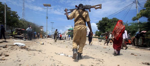 A Somali policeman walks towards the scene of an explosion (File) A Somali policeman walks towards the scene of an explosion (File) - Sputnik International