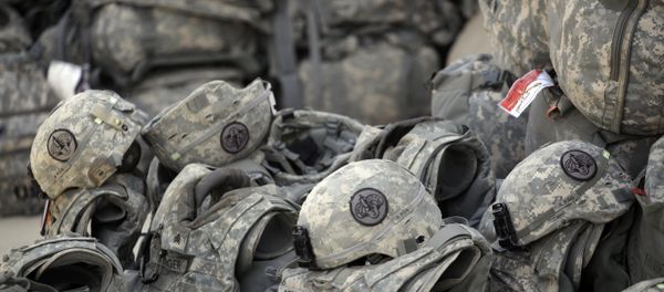 Helmets and body armor are are stacked and ready to go outside the passenger terminal at Sather Air Base in Baghdad, Iraq, for U.S. Army soldiers from the 3rd Armored Cavalry Regiment to begin their journey home to the United States after a yearlong deployment (File) Helmets and body armor are are stacked and ready to go outside the passenger terminal at Sather Air Base in Baghdad, Iraq, for U.S. Army soldiers from the 3rd Armored Cavalry Regiment to begin their journey home to the United States after a yearlong deployment (File) - Sputnik International