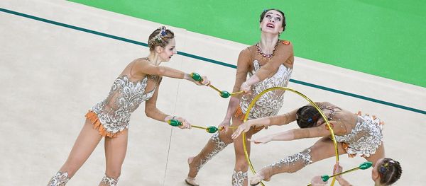 The Russian national team on Sunday won a gold medal at the women's rhythmic gymnastics all-around competition at the ongoing Olympic Games in Rio de Janeiro. - Sputnik International