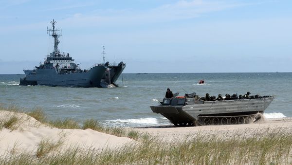 NATO troops make a massive amphibious landing off the coast of Ustka, northern Poland, during NATO military sea exercises BALTOPS (Baltic Operations) on June 17, 2015 in the Baltic Sea NATO troops make a massive amphibious landing off the coast of Ustka, northern Poland, during NATO military sea exercises BALTOPS (Baltic Operations) on June 17, 2015 in the Baltic Sea - Sputnik International