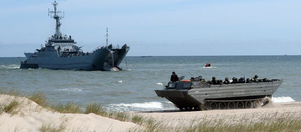 NATO troops make a massive amphibious landing off the coast of Ustka, northern Poland, during NATO military sea exercises BALTOPS (Baltic Operations) on June 17, 2015 in the Baltic Sea NATO troops make a massive amphibious landing off the coast of Ustka, northern Poland, during NATO military sea exercises BALTOPS (Baltic Operations) on June 17, 2015 in the Baltic Sea - Sputnik International
