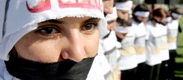 Yazidi women attend a demonstration at a refugee camp in Kurdish-dominated city of Diyarbakir, Turkey, to mark the second anniversary of what a U.N.-appointed commission of independent war crimes investigators termed a genocide against the Yazidi population by the Islamic State, August 3, 2016 - Sputnik International