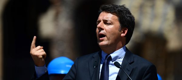 This file photo taken on July 1, 2016 shows Italian Prime Minister Matteo Renzi speaking during a press conference in Rome to announce the end of the restoration of the façade of the Colosseum financed by top luxury brands - Sputnik International