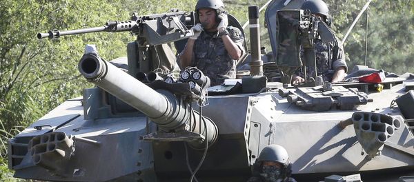 South Korean army soldiers ride a K-1 tank during the annual exercise in Paju, South Korea, near the border with North Korea South Korean army soldiers ride a K-1 tank during the annual exercise in Paju, South Korea, near the border with North Korea - Sputnik International