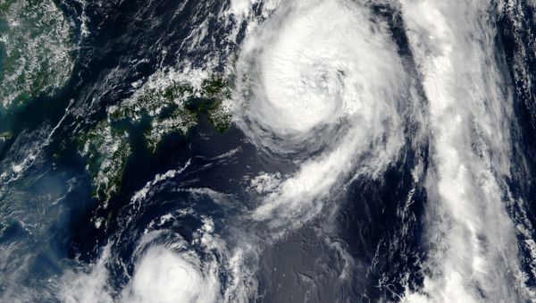 This August 22, 2016 NASA satellite image shows Typhoon Mindulle(top) over Japan This August 22, 2016 NASA satellite image shows Typhoon Mindulle(top) over Japan - Sputnik International