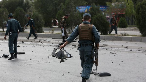 Afghan security personnel work at the site of an explosion in Kabul, Afghanistan, Thursday, Aug. 18, 2016 Afghan security personnel work at the site of an explosion in Kabul, Afghanistan, Thursday, Aug. 18, 2016 - Sputnik International