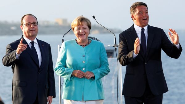 Italian Prime Minister Matteo Renzi, German Chancellor Angela Merkel (C) and French President Francois Hollande (L) pose on the Italian aircraft carrier Garibaldi off the coast of Ventotene island, central Italy, August 22, 2016. Italian Prime Minister Matteo Renzi, German Chancellor Angela Merkel (C) and French President Francois Hollande (L) pose on the Italian aircraft carrier Garibaldi off the coast of Ventotene island, central Italy, August 22, 2016. - Sputnik International