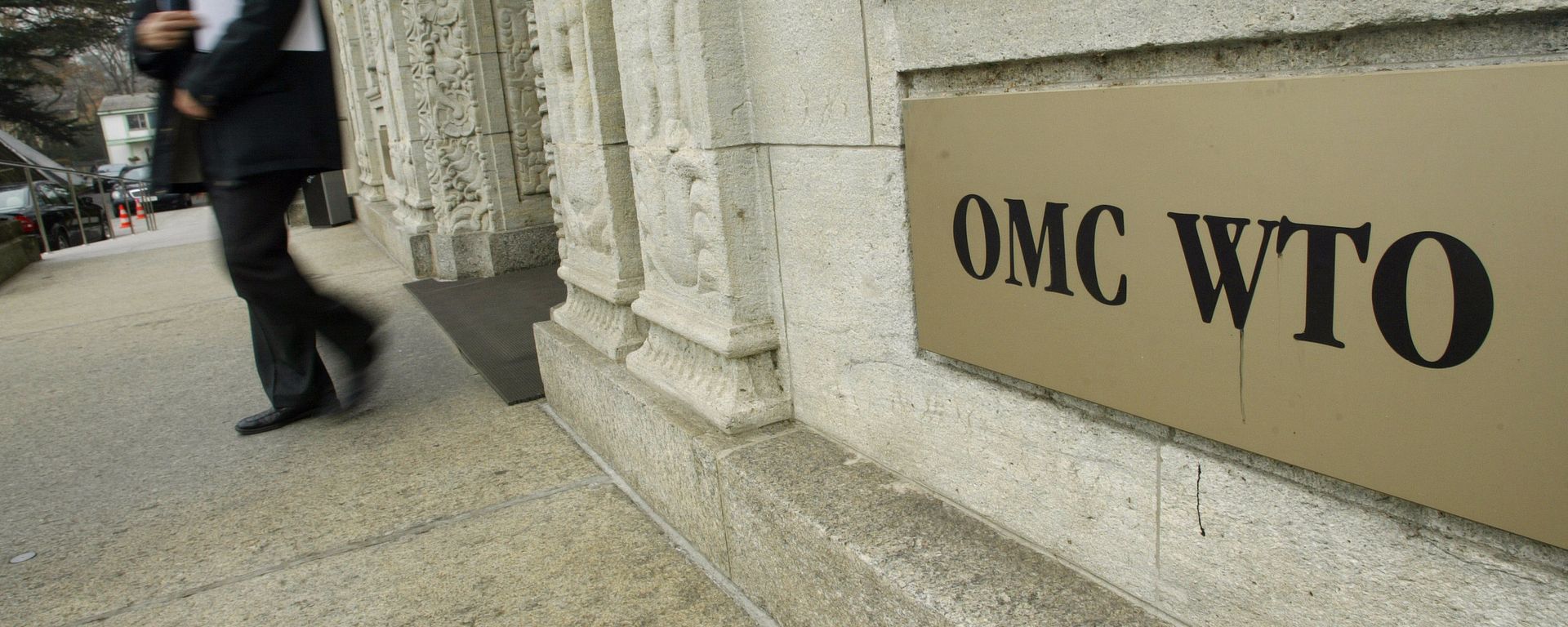 A person gets out of the World Trade Organization (WTO) headquarter in Geneva (File) - Sputnik International, 1920, 19.06.2021
