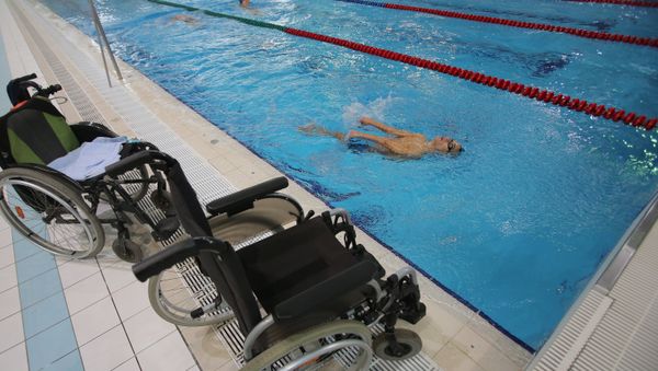 Russian Paralympic swimming team during training session - Sputnik International