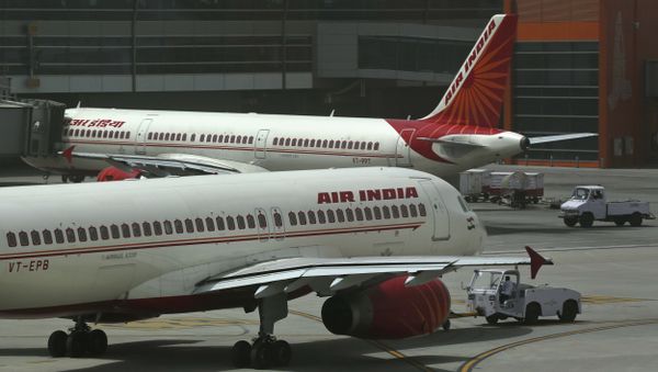 Air India planes are parked on the tarmac at the Terminal 3 of Indira Gandhi International Airport in New Delhi, India, Friday, May 18, 2012 Air India planes are parked on the tarmac at the Terminal 3 of Indira Gandhi International Airport in New Delhi, India, Friday, May 18, 2012 - Sputnik International