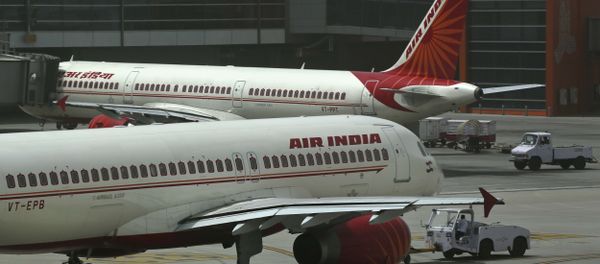 Air India planes are parked on the tarmac at the Terminal 3 of Indira Gandhi International Airport in New Delhi, India, Friday, May 18, 2012 Air India planes are parked on the tarmac at the Terminal 3 of Indira Gandhi International Airport in New Delhi, India, Friday, May 18, 2012 - Sputnik International