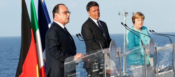 Italian Prime Minister Matteo Renzi, German Chancellor Angela Merkel (R) and French President Francois Hollande (L) lead a news conference on the Italian aircraft carrier Garibaldi off the coast of Ventotene island, central Italy, August 22, 2016. Italian Prime Minister Matteo Renzi, German Chancellor Angela Merkel (R) and French President Francois Hollande (L) lead a news conference on the Italian aircraft carrier Garibaldi off the coast of Ventotene island, central Italy, August 22, 2016. - Sputnik International