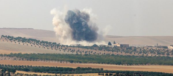 Smoke rises from the Syrian border town of Jarablus as it is pictured from the Turkish town of Karkamis, in the southeastern Gaziantep province, Turkey, August 24, 2016 Smoke rises from the Syrian border town of Jarablus as it is pictured from the Turkish town of Karkamis, in the southeastern Gaziantep province, Turkey, August 24, 2016 - Sputnik International