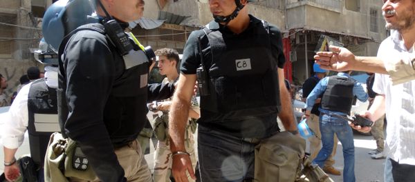 United Nations (UN) arms experts arrive to inspect a site suspected of being hit by a deadly chemical weapons attack last week in the Eastern Ghouta area on the northeastern outskirts of Damascus. (File United Nations (UN) arms experts arrive to inspect a site suspected of being hit by a deadly chemical weapons attack last week in the Eastern Ghouta area on the northeastern outskirts of Damascus. (File - Sputnik International