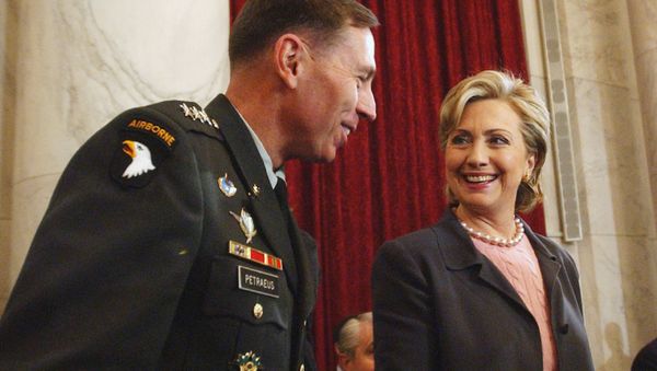 Hillary Rodham Clinton talks with Lt. Gen. David Petraeus on Capitol Hill. - Sputnik International