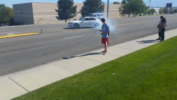 Close Call When Kid Attempts to Drift a BMW - Sputnik International