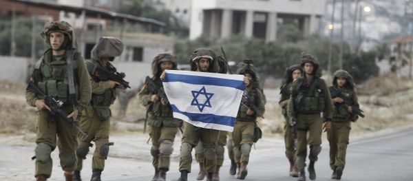 Israeli soldiers holding their national flag patrol a street in the West Bank village of Beit Furik, southeast of Nablus, early on June 20, 2014. Israeli soldiers holding their national flag patrol a street in the West Bank village of Beit Furik, southeast of Nablus, early on June 20, 2014. - Sputnik International