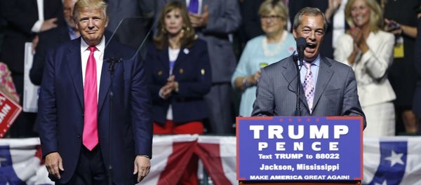 Nigel Farage, ex-leader of the British UKIP party, speaks as Republican presidential candidate Donald Trump, left, listens, at Trump's campaign rally in Jackson, Miss., Wednesday, Aug. 24, 2016. Nigel Farage, ex-leader of the British UKIP party, speaks as Republican presidential candidate Donald Trump, left, listens, at Trump's campaign rally in Jackson, Miss., Wednesday, Aug. 24, 2016. - Sputnik International