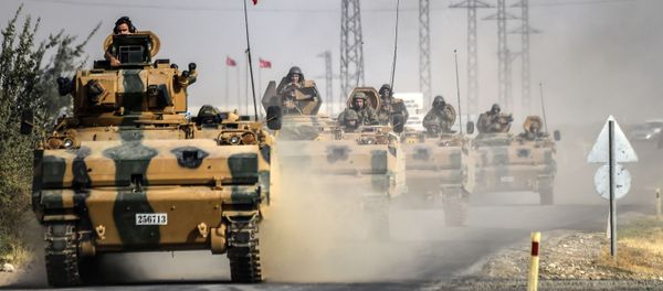 This picture taken around 5 kilometres west from the Turkish Syrian border city of Karkamis in the southern region of Gaziantep, on August 25, 2016 shows Turkish Army tanks driving to the Syrian Turkish border town of Jarabulus. This picture taken around 5 kilometres west from the Turkish Syrian border city of Karkamis in the southern region of Gaziantep, on August 25, 2016 shows Turkish Army tanks driving to the Syrian Turkish border town of Jarabulus. - Sputnik International