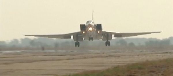 Russian Tupolev Tu-22M3 long-range bomber landing at an air base near the Iranian city of Hamadan - Sputnik International