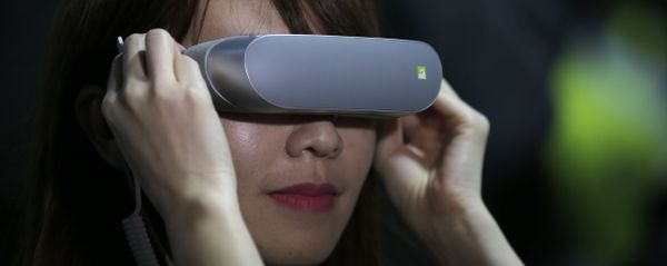 In this Feb. 21. 2016, file photo, a woman uses LG 360 VR glasses during the LG unpacked 2016 event on the eve of the week's Mobile World Congress wireless show, in Barcelona, Spain In this Feb. 21. 2016, file photo, a woman uses LG 360 VR glasses during the LG unpacked 2016 event on the eve of the week's Mobile World Congress wireless show, in Barcelona, Spain - Sputnik International