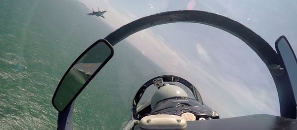 In this undated photo released Saturday, Aug. 6, 2016, by China's Xinhua News Agency, a pair of Chinese fighter jets fly during a patrol over the South China Sea - Sputnik International