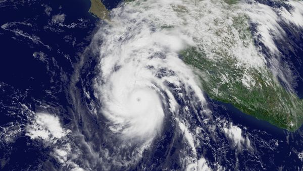 This National Oceanic and Atmospheric Administration (NOAA) satellite handout image shows Hurricane Jimena located south of Cabo San Lucas, Mexico on August 31, 2009 This National Oceanic and Atmospheric Administration (NOAA) satellite handout image shows Hurricane Jimena located south of Cabo San Lucas, Mexico on August 31, 2009 - Sputnik International