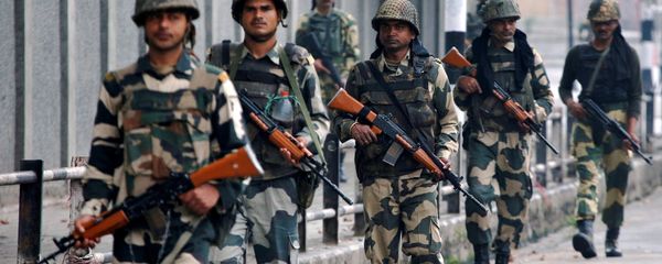 Indian Border Security Force (BSF) soldiers patrol a street in Srinagar as the city remains under curfew following weeks of violence in Kashmir August 27, 2016 Indian Border Security Force (BSF) soldiers patrol a street in Srinagar as the city remains under curfew following weeks of violence in Kashmir August 27, 2016 - Sputnik International