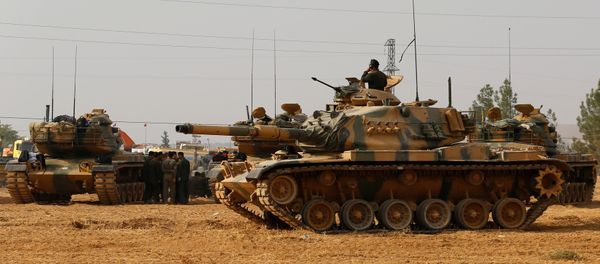 Turkish army tanks and military personal are stationed in Karkamis on the Turkish-Syrian border in the southeastern Gaziantep province, Turkey, August 25, 2016 Turkish army tanks and military personal are stationed in Karkamis on the Turkish-Syrian border in the southeastern Gaziantep province, Turkey, August 25, 2016 - Sputnik International