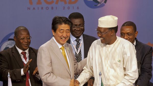 Japanese Prime Minister Shinzo Abe, second left, shakes hands with Chad's President Idriss Deby Itno after a joint press conference on the closing session of TICAD, Kenya,Aug.28,2016 Japanese Prime Minister Shinzo Abe, second left, shakes hands with Chad's President Idriss Deby Itno after a joint press conference on the closing session of TICAD, Kenya,Aug.28,2016 - Sputnik International