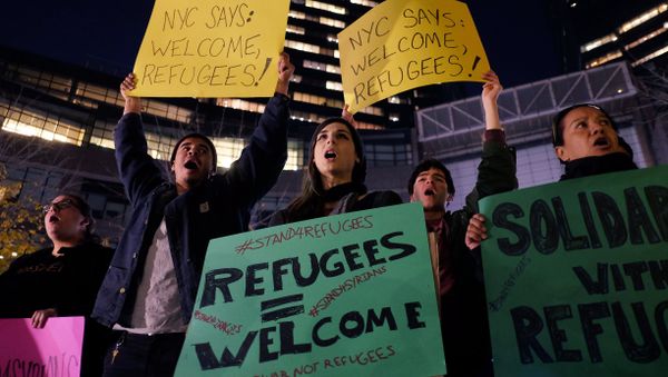 Human rights activists and people from the Muslim community display placards during a demonstration in New York in solidarity for Syrian and Iraqi refugees (File) Human rights activists and people from the Muslim community display placards during a demonstration in New York in solidarity for Syrian and Iraqi refugees (File) - Sputnik International