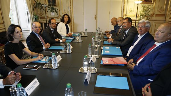 French Interior Minister Bernard Cazeneuve (2ndL), the president of the French Council of the Muslim Faith (CFCM) Anouar Kbibech (3rdR), former French minister Jean-Pierre Chevenement (2ndR) and Paris' Mosque Rector Dalil Boubakeur (R) attend a meeting with representatives of the Muslim community on August 29, 2016 in Paris French Interior Minister Bernard Cazeneuve (2ndL), the president of the French Council of the Muslim Faith (CFCM) Anouar Kbibech (3rdR), former French minister Jean-Pierre Chevenement (2ndR) and Paris' Mosque Rector Dalil Boubakeur (R) attend a meeting with representatives of the Muslim community on August 29, 2016 in Paris - Sputnik International