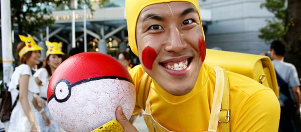 A man wearing Pokemon's character Pikachu costume - Sputnik International