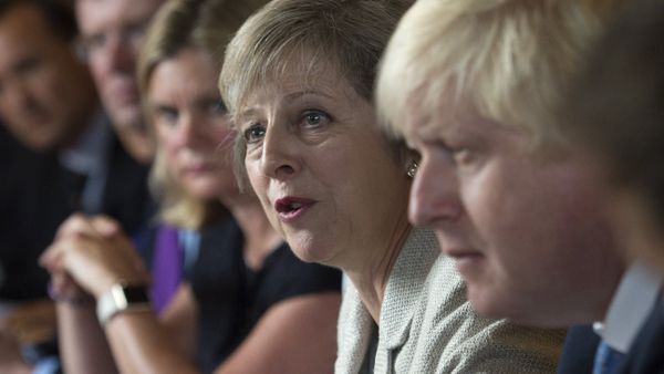 Britain's Prime Minister Theresa May (2R) speaks as she chairs a cabinet meeting sat next to British Foreign Secretary Boris Johnson (R) at the Prime Minister's country retreat Chequers near the village of Ellesborough in Buckinghamshire, northwest of London, on August 30, 2016. - Sputnik International