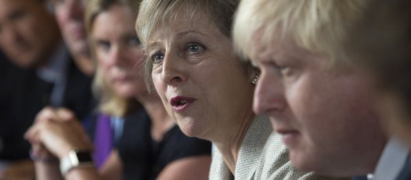 Britain's Prime Minister Theresa May (2R) speaks as she chairs a cabinet meeting sat next to British Foreign Secretary Boris Johnson (R) at the Prime Minister's country retreat Chequers near the village of Ellesborough in Buckinghamshire, northwest of London, on August 30, 2016. Britain's Prime Minister Theresa May (2R) speaks as she chairs a cabinet meeting sat next to British Foreign Secretary Boris Johnson (R) at the Prime Minister's country retreat Chequers near the village of Ellesborough in Buckinghamshire, northwest of London, on August 30, 2016. - Sputnik International