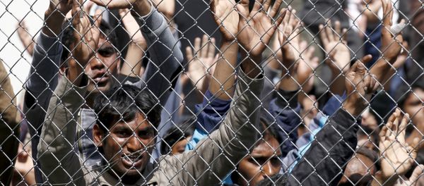 Migrants demonstrate inside the Moria registration centre on the Greek island of Lesbos, April 5, 201 - Sputnik International