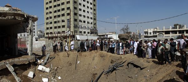Yemenis gather around a crater caused by a Saudi-led airstrike that targeted a building in the centre of the capital Sanaa (File) Yemenis gather around a crater caused by a Saudi-led airstrike that targeted a building in the centre of the capital Sanaa (File) - Sputnik International