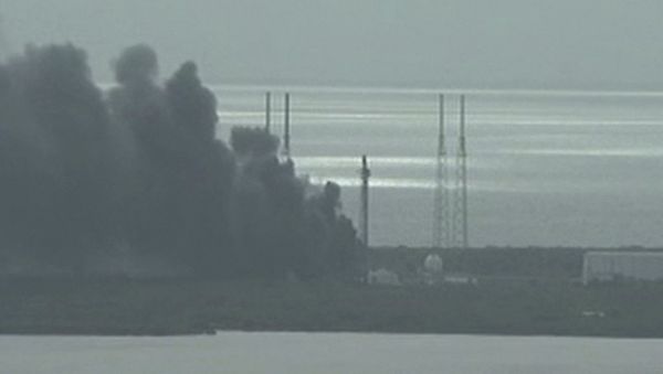 Smoke rising on the launch site of SpaceX Falcon 9 rocket in Cape Canaveral, Florida Smoke rising on the launch site of SpaceX Falcon 9 rocket in Cape Canaveral, Florida - Sputnik International