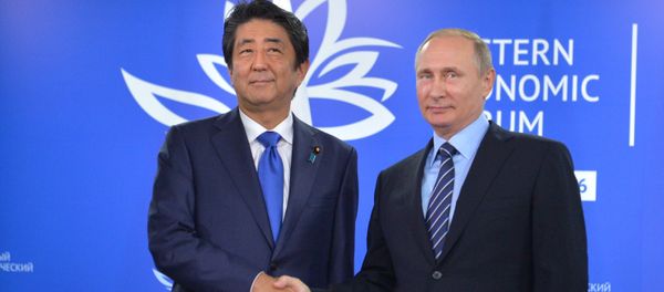 Japanese Prime Minister's Shinzo Abe and Russian President Vladimir Putin Japanese Prime Minister's Shinzo Abe and Russian President Vladimir Putin - Sputnik International
