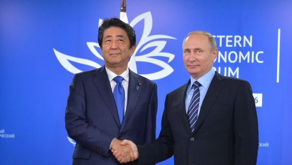 Japanese Prime Minister's Shinzo Abe and Russian President Vladimir Putin Japanese Prime Minister's Shinzo Abe and Russian President Vladimir Putin - Sputnik International