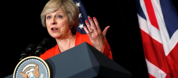 Britain's Prime Minister Theresa May answers a reporter's question at G20 Summit, in Ming Yuan Hall at Westlake Statehouse in Hangzhou, China September 4, 2016. Britain's Prime Minister Theresa May answers a reporter's question at G20 Summit, in Ming Yuan Hall at Westlake Statehouse in Hangzhou, China September 4, 2016. - Sputnik International