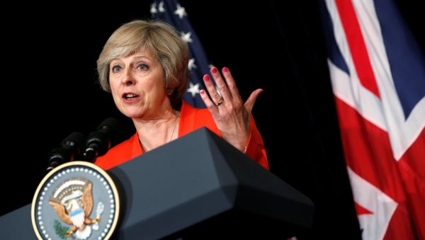 Britain's Prime Minister Theresa May answers a reporter's question at G20 Summit, in Ming Yuan Hall at Westlake Statehouse in Hangzhou, China September 4, 2016. Britain's Prime Minister Theresa May answers a reporter's question at G20 Summit, in Ming Yuan Hall at Westlake Statehouse in Hangzhou, China September 4, 2016. - Sputnik International