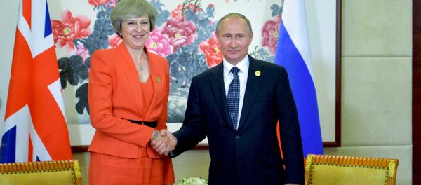 September 4, 2016. Russian President Vladimir Putin and British Prime Minister Theresa May during a meeting held as part of the G20 Summit in Hangzhou. - Sputnik International